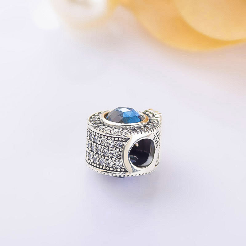 Brilliant pavé beads sparkling blue crown letter O charm