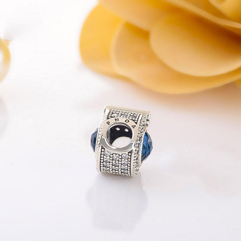 Brilliant pavé beads sparkling blue crown letter O charm