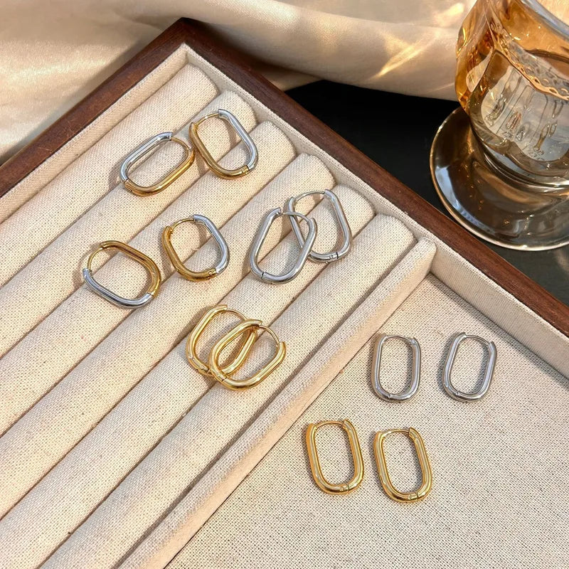 Two-Tone Oval Hoop Earrings – Gold & Silver Stainless Steel